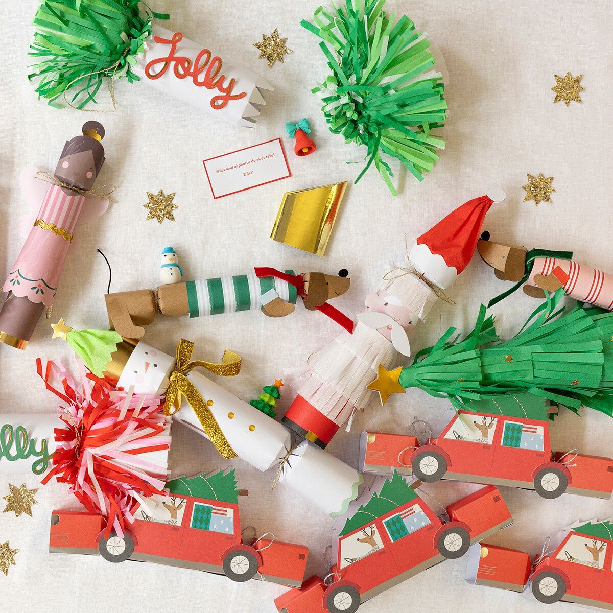 Red and green Christmas crackers with dogs cars trees and festive designs for holiday from Parte Haus party supply store in Bethesda MD