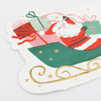 red and green Santa themed paper napkin with presents for Christmas from Parte Haus party supply store in Bethesda Maryland