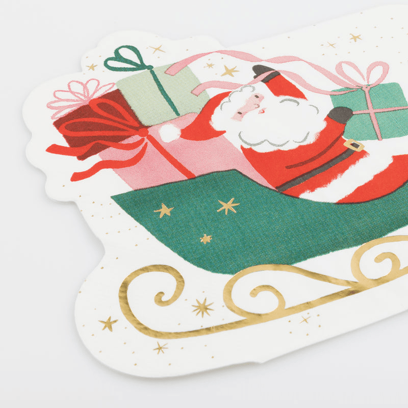 red and green Santa themed paper napkin with presents for Christmas from Parte Haus party supply store in Bethesda Maryland