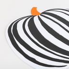 Black and white pumpkin paper placemat with orange stem Halloween theme from Parte Haus party supply store in Bethesda MD