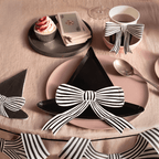 black witch hat plate with striped bow Halloween table setting from Parte Haus party supply store in Bethesda Maryland