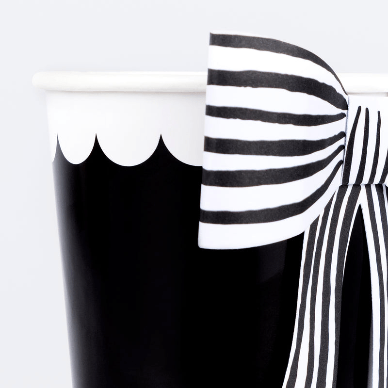 Black and white paper cup with a striped bow for birthday from Parte Haus party supply store in Bethesda MD