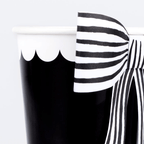 Black and white paper cup with a striped bow for birthday from Parte Haus party supply store in Bethesda MD