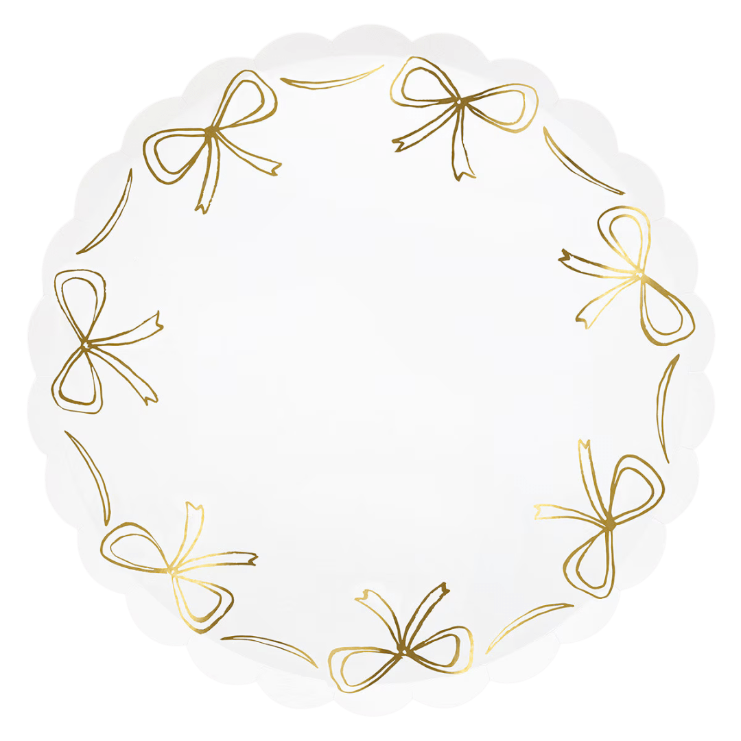 white and gold scalloped plate with bow design birthday or celebration from Parte Haus party supply store in Bethesda MD