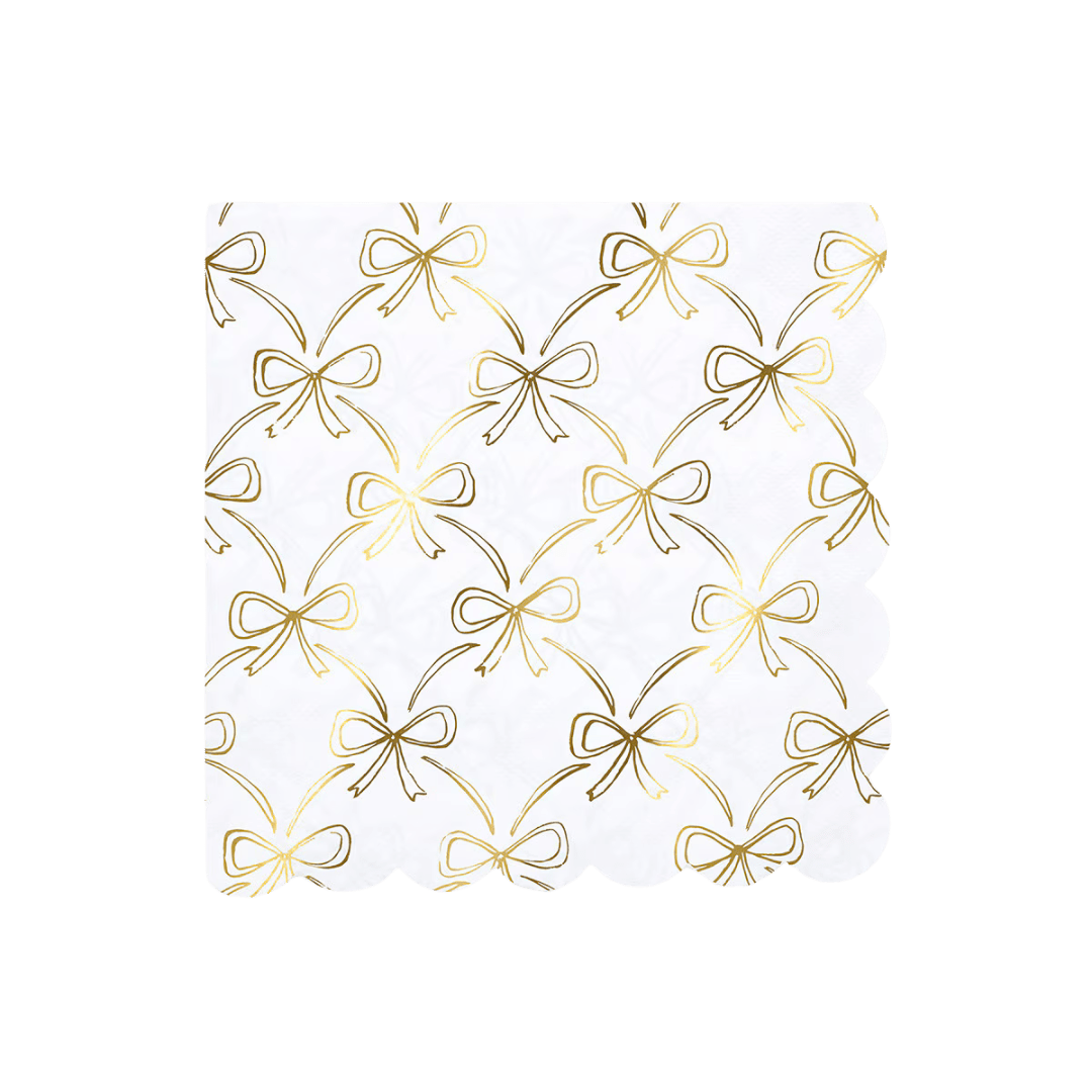 White gold bow napkin with scalloped edge for elegant events from Parte Haus party supply store in Bethesda MD