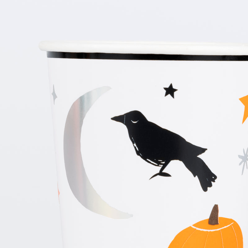 white Halloween paper cup with black crow pumpkin and stars from Parte Haus party supply store in Bethesda Maryland