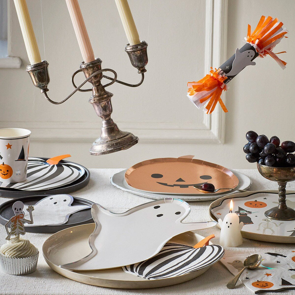 White ghost and orange pumpkin Halloween plates festive table decor from Parte Haus party supply store in Bethesda MD