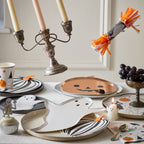 White ghost and orange pumpkin Halloween plates festive table decor from Parte Haus party supply store in Bethesda MD
