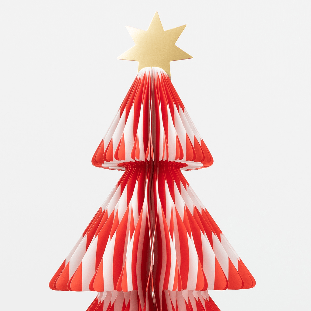 Red and white Christmas tree paper centerpiece with gold star for holiday party from Parte Haus party supply store in Bethesda MD