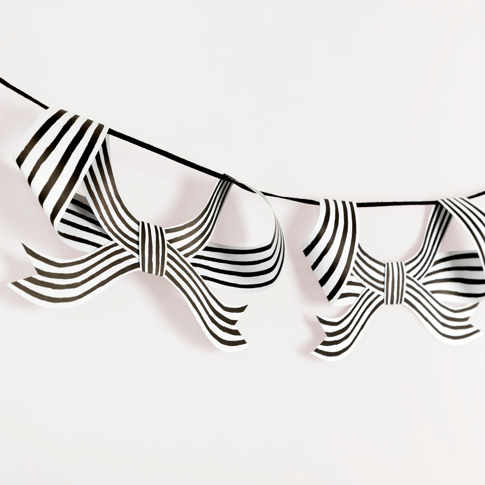 Black and white striped bow garland decoration for birthday from Parte Haus party supply store in Bethesda MD