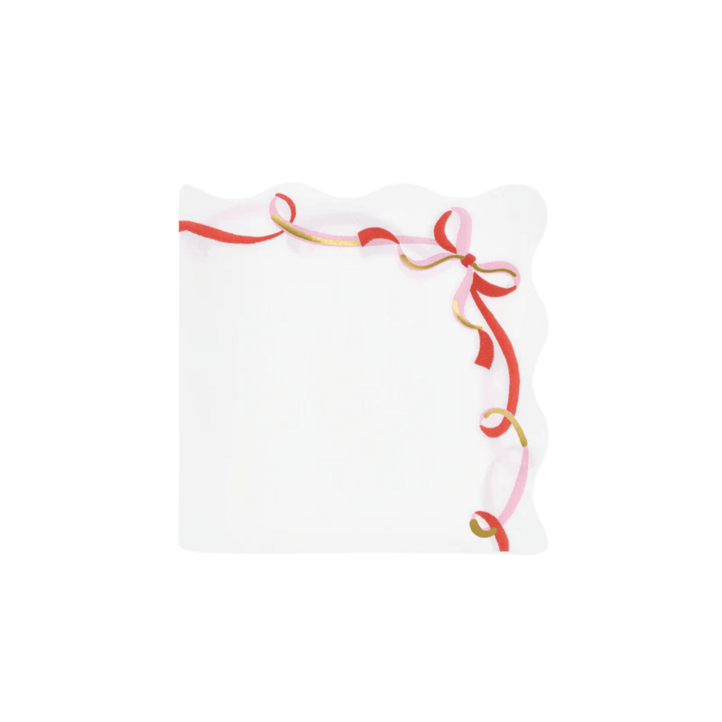 White napkin with red and gold ribbon bow edge for celebration from Parte Haus party supply store in Bethesda Maryland