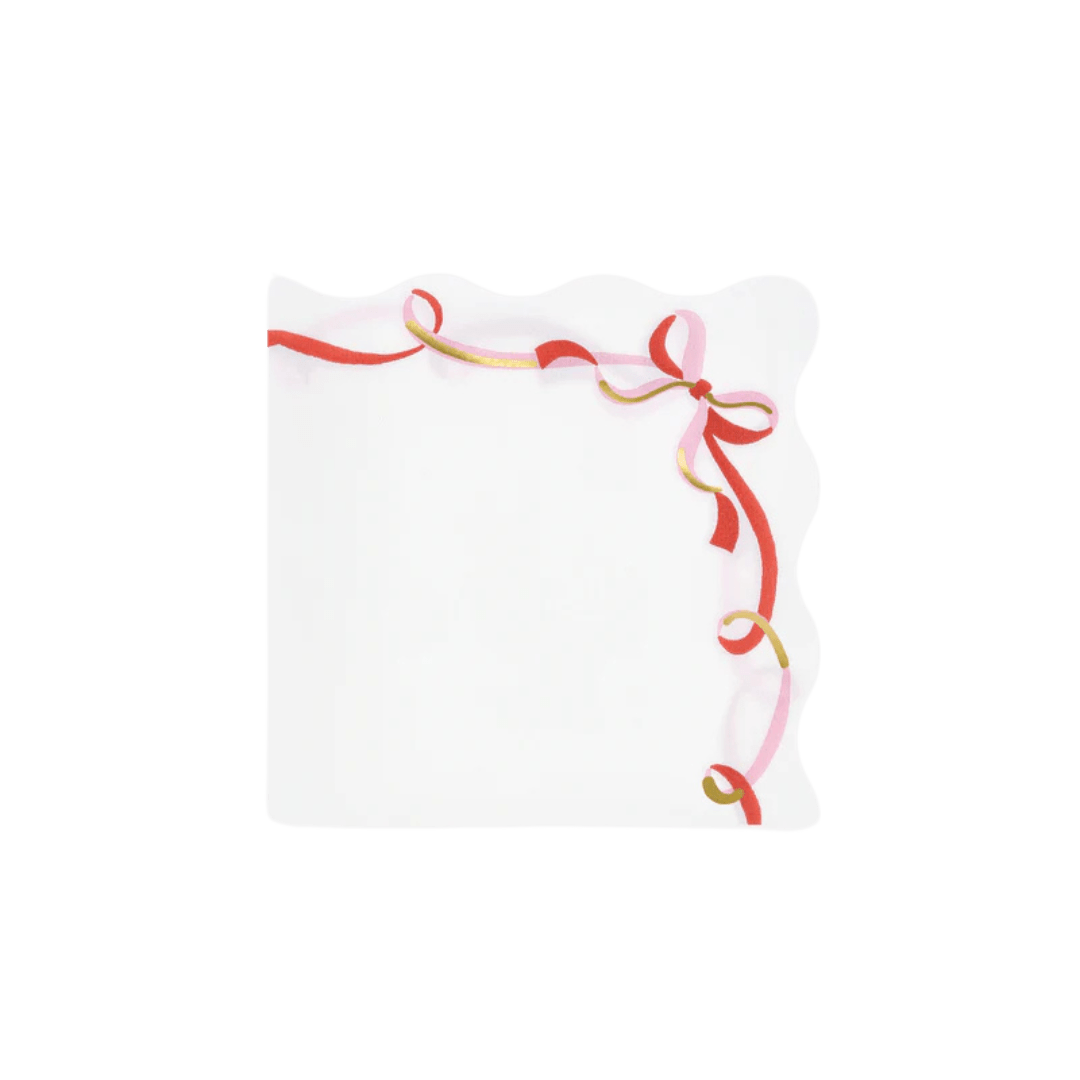 White napkin with red and gold ribbon bow edge for celebration from Parte Haus party supply store in Bethesda Maryland