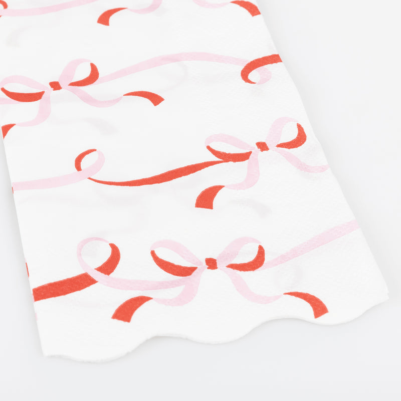 Pink and red bow paper napkin with scalloped edge for birthday from Parte Haus party supply store in Bethesda MD