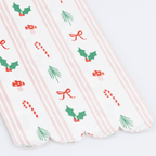 Red and green Christmas napkin with holly candy canes bows Parte Haus party supply store in Bethesda MD
