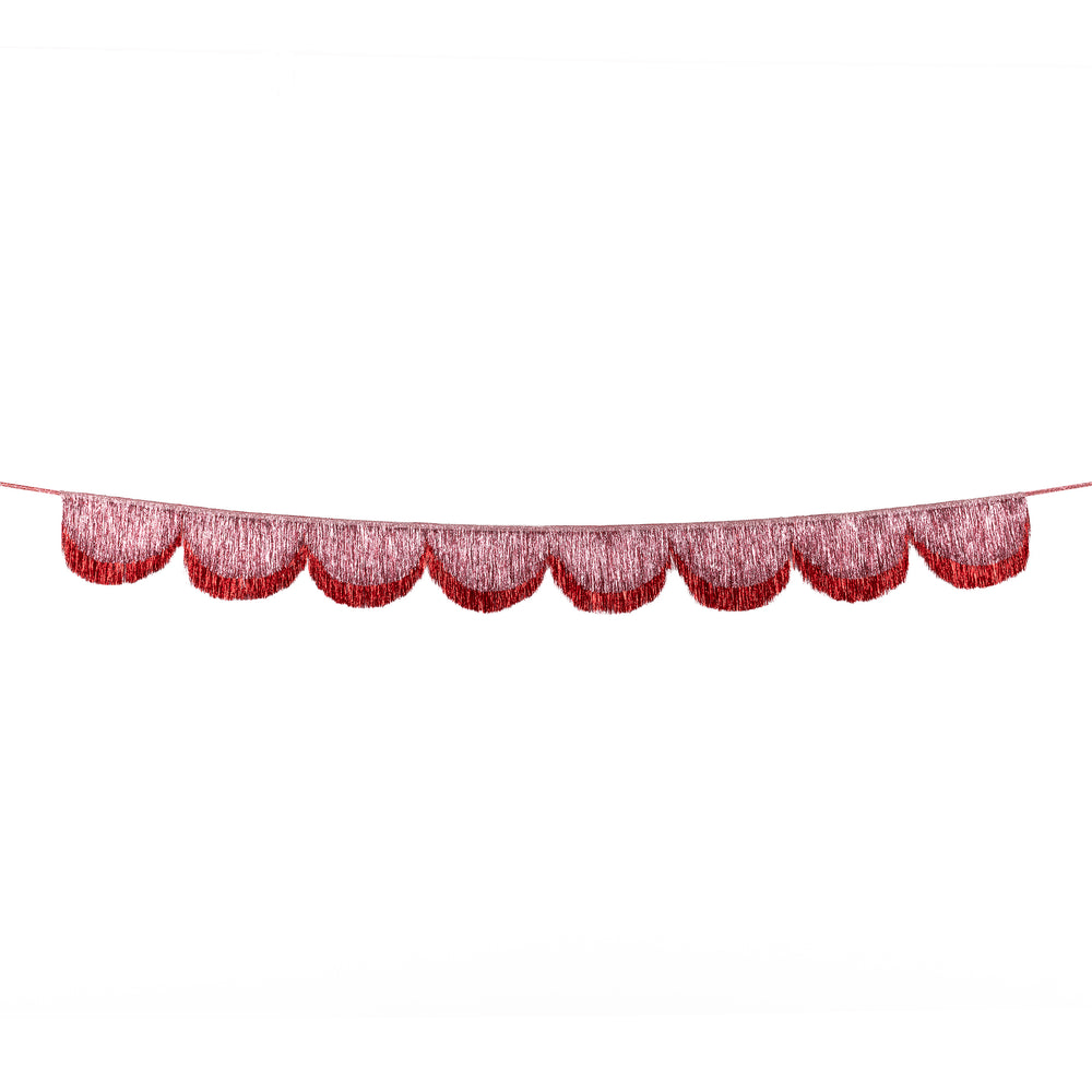 Red fringe garland hanging decoration for celebration from Parte Haus party supply store in Bethesda Maryland