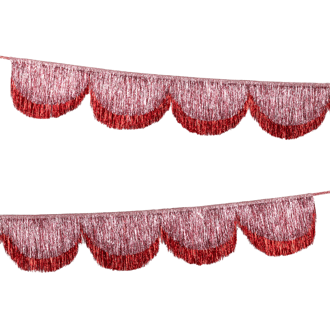 Red metallic fringe garland banner for festive celebration from Parte Haus party supply store in Bethesda MD