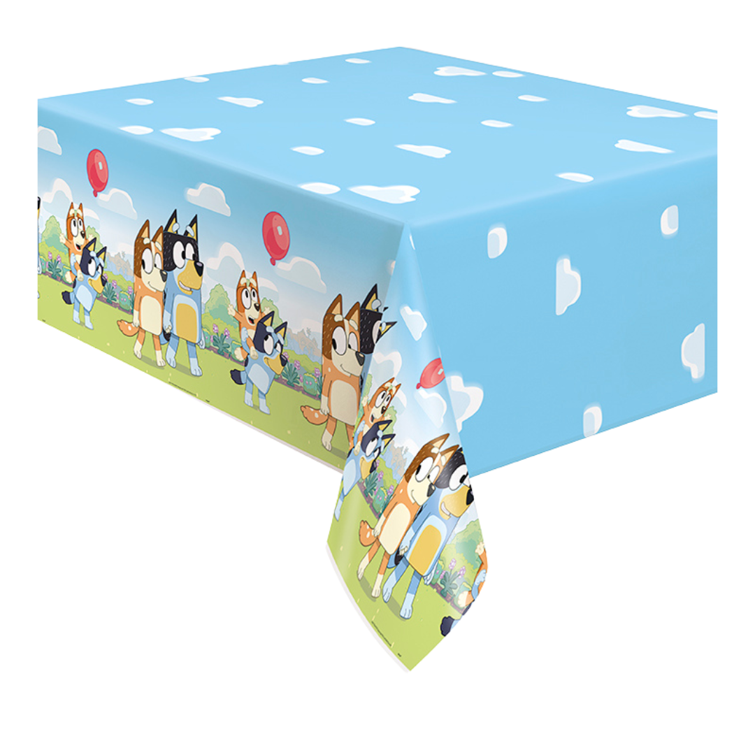 Blue cartoon dog tablecloth with clouds and character pattern birthday design from Parte Haus party supply store in Bethesda MD