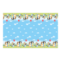 Bluey table cover with blue sky clouds cartoon dogs and red balloons birthday design from Parte Haus party supply store in Bethesda Maryland