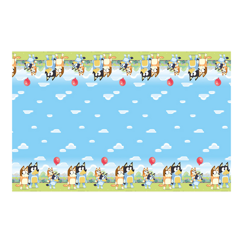 Bluey table cover with blue sky clouds cartoon dogs and red balloons birthday design from Parte Haus party supply store in Bethesda Maryland