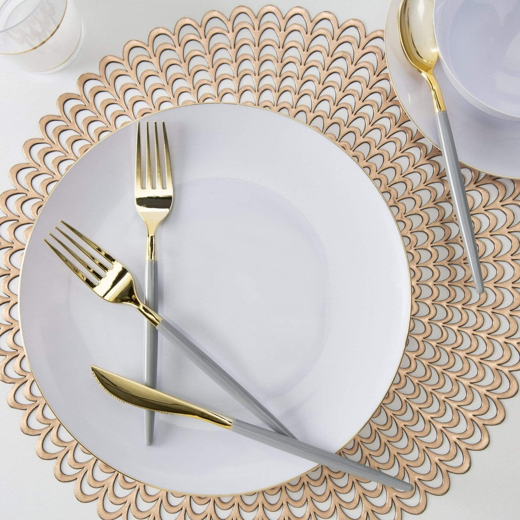 Gold and white plate set with gold flatware elegant dinner setting from Parte Haus party supply store in Bethesda MD