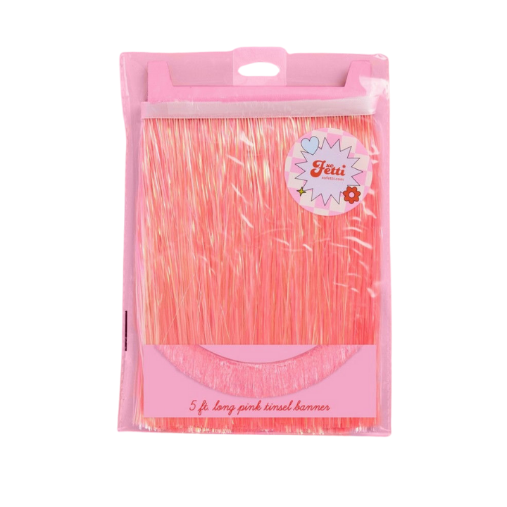 Pink tinsel banner with iridescent shine for birthday celebration from Parte Haus party supply store in Bethesda MD