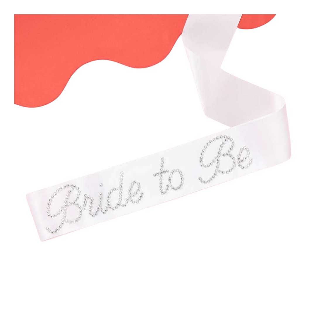 White Bride to Be sash with rhinestone lettering for bridal shower from Parte Haus party supply store in Bethesda Maryland