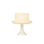 White cake stand with classic round vanilla frosted cake for birthdays from Parte Haus party supply store in Bethesda Maryland