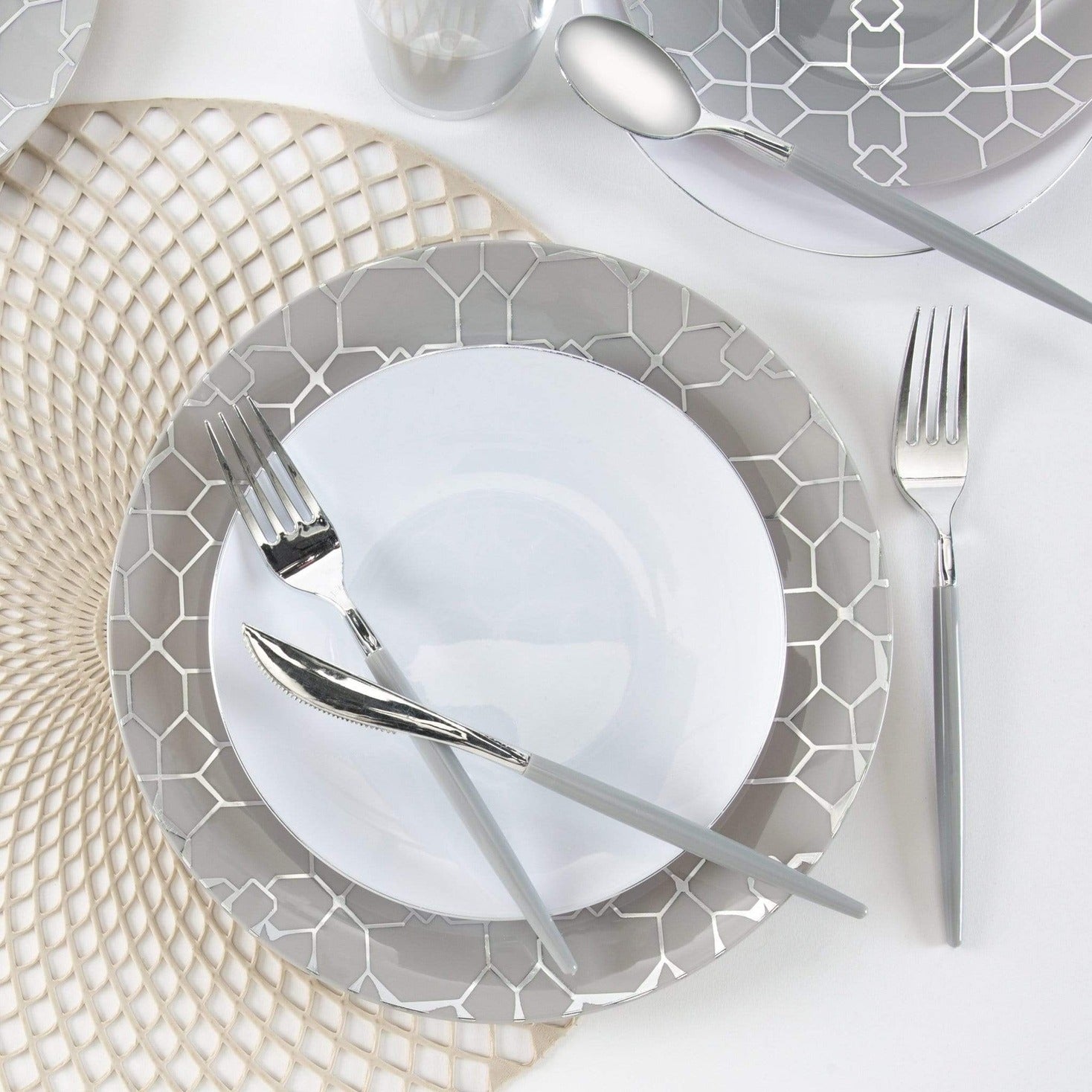 Silver and white geometric plate set modern table setting from Parte Haus party supply store in Bethesda MD
