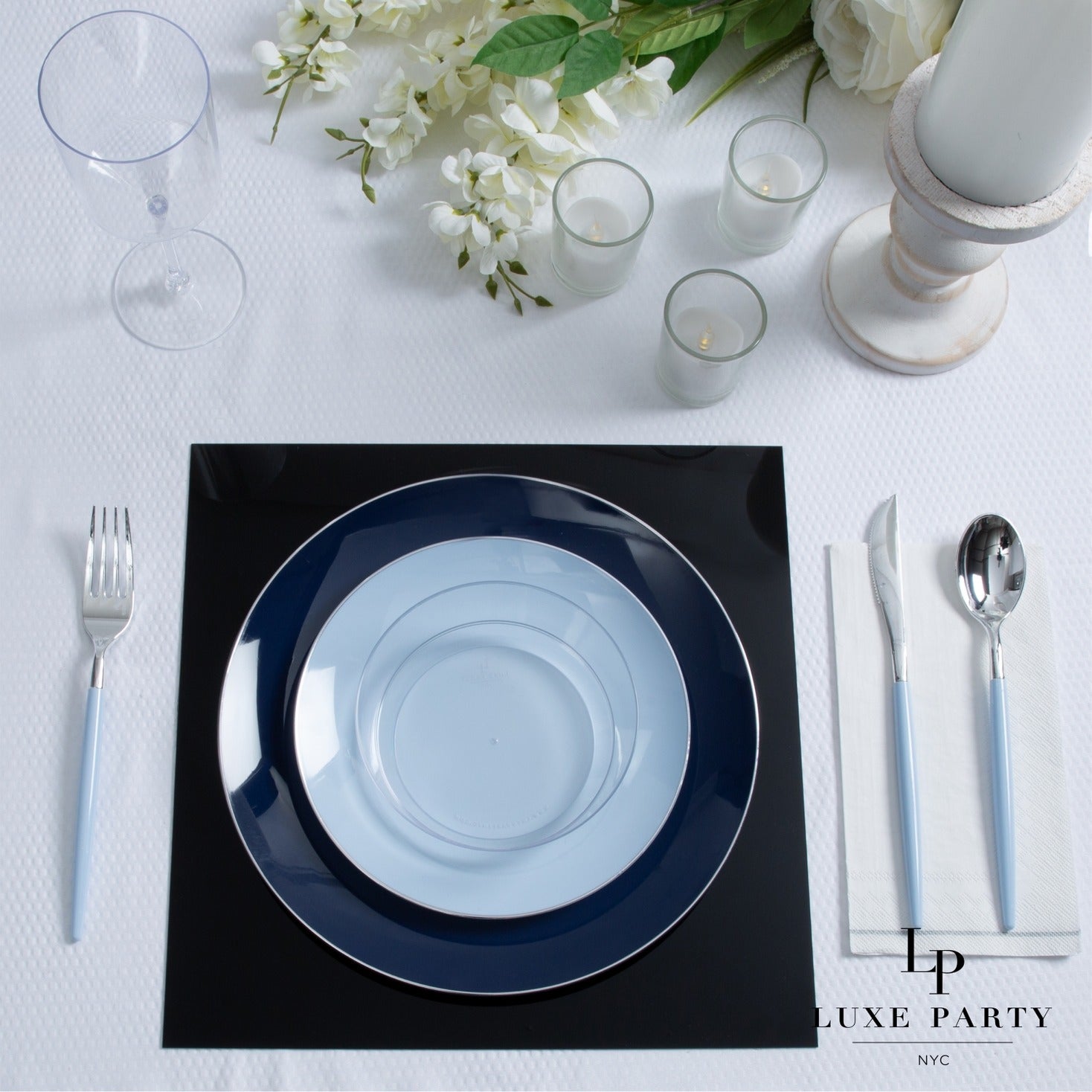 Light blue and navy plate set elegant table setting for wedding from Parte Haus party supply store in Bethesda MD