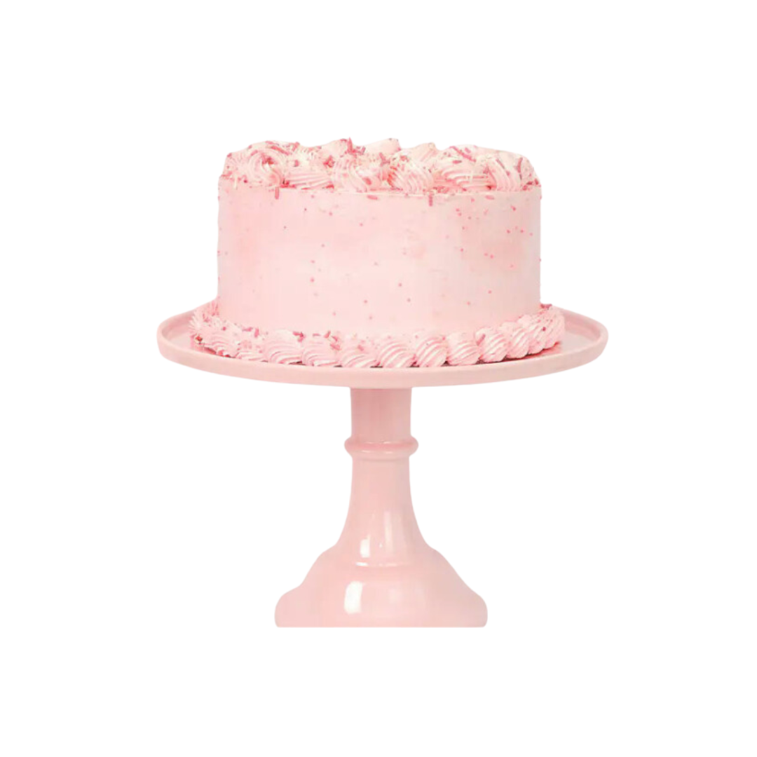 Pink cake stand with swirl piped cake birthday theme from Parte Haus party supply store in Bethesda Maryland