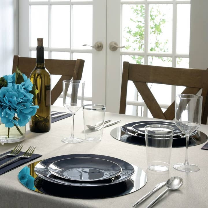 Navy blue plates elegant dinner table setting for celebration from Parte Haus party supply store in Bethesda Maryland