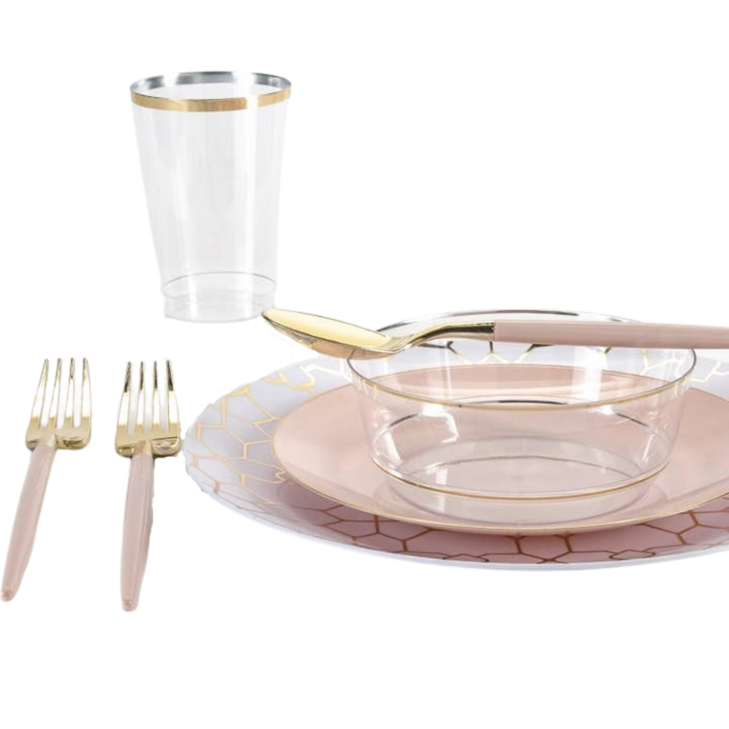 Pink gold dinnerware set with plates cups and cutlery for celebration from Parte Haus party supply store in Bethesda MD