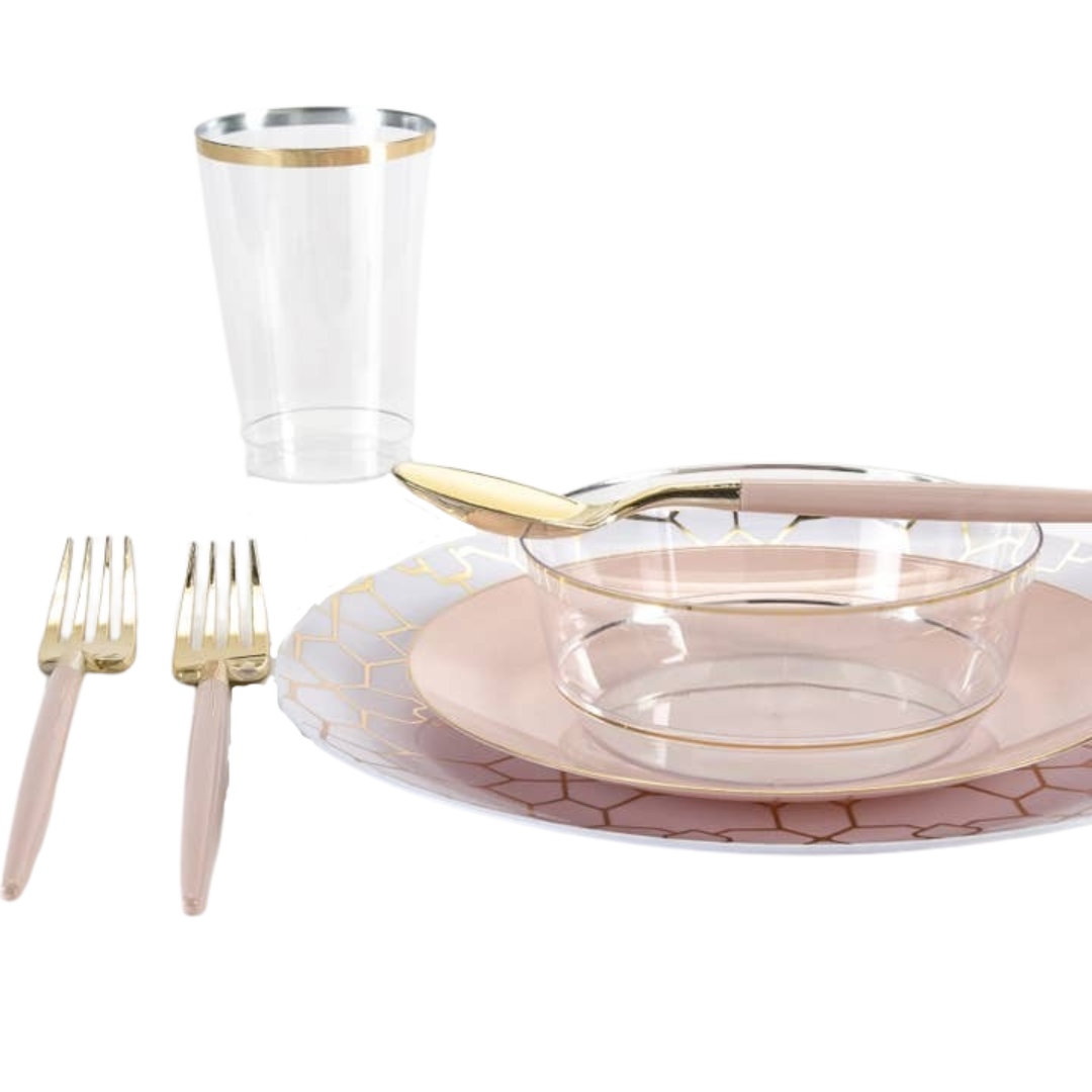 Pink gold dinnerware set with plates cups and cutlery for celebration from Parte Haus party supply store in Bethesda MD