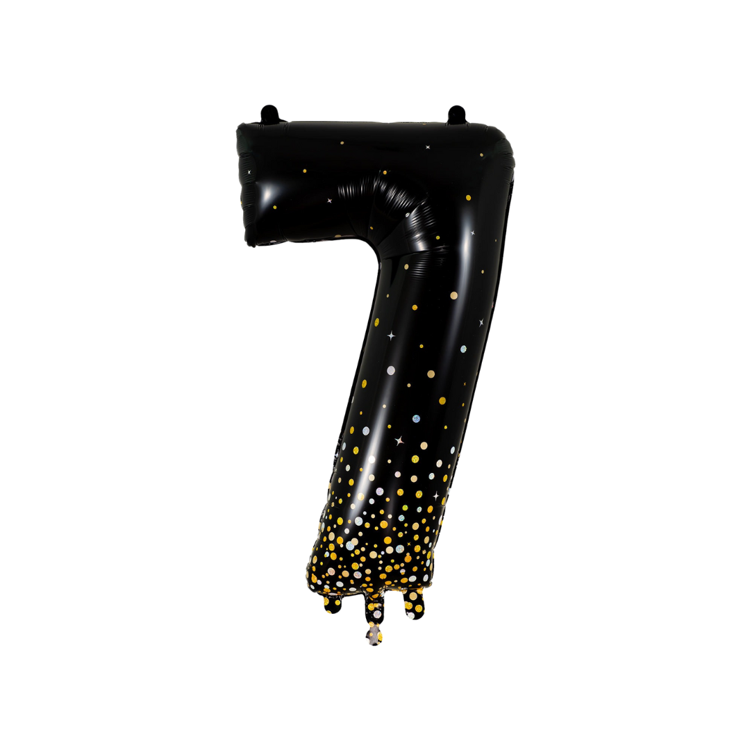 Black holographic number 7 foil balloon with gold dots birthday theme from Parte Haus party supply store in Bethesda MD.