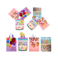 Colorful birthday gift bags with balloons and cake designs for birthday from Parte Haus party supply store in Bethesda MD