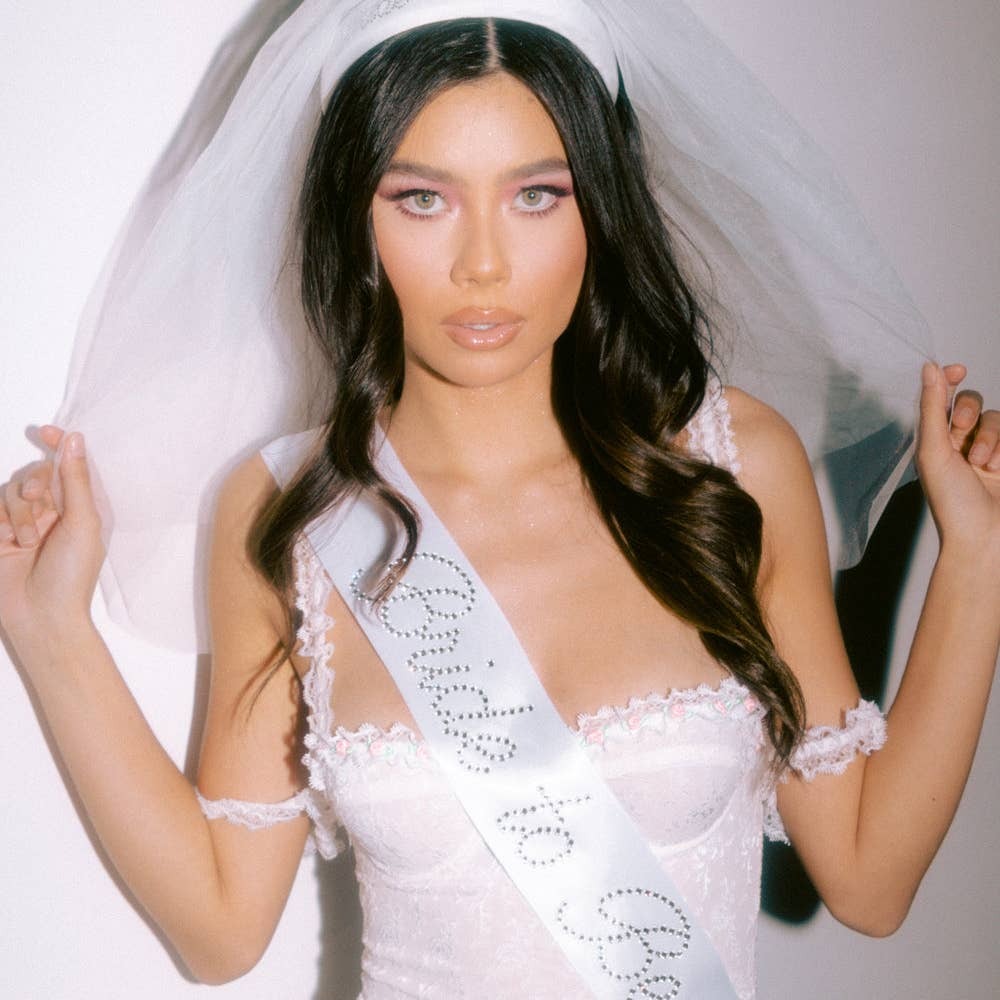 White bride to be sash and veil bachelorette outfit for bridal shower from Parte Haus party supply store in Bethesda MD