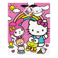 Pink Hello Kitty gift bag with rainbow cartoon friends and cupcake birthday theme from Parte Haus party supply store in Bethesda MD