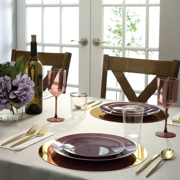 Purple and gold tableware elegant dinner setting for celebration from Parte Haus party supply store in Bethesda Maryland