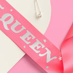 Pink queen sash with silver letters and stars for bachelorette from Parte Haus party supply store in Bethesda Maryland
