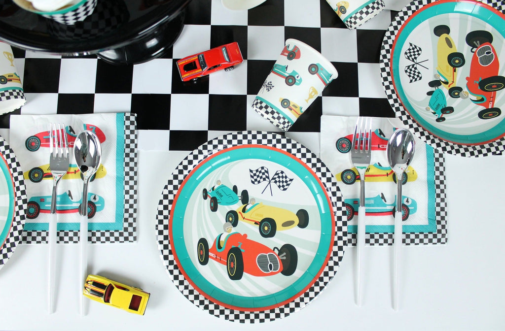 Multicolor race car plates and checkered napkins race car birthday tableware from Parte Haus party supply store in Bethesda MD