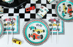 Multicolor race car plates and checkered napkins race car birthday tableware from Parte Haus party supply store in Bethesda MD