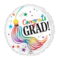 Rainbow graduation balloon with Congrats Grad text stars and tassel from Parte Haus party supply store in Bethesda Maryland