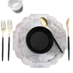 Marble and black dinnerware with gold cutlery elegant table setting from Parte Haus party supply store in Bethesda MD