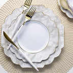 Marble gold plates with gold cutlery elegant dinnerware for celebration from Parte Haus party supply store in Bethesda MD