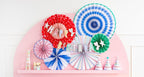 Colorful paper fan decorations happy birthday banner hats and treats for birthday from Parte Haus party supply store in Bethesda Maryland