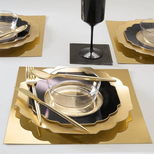 Gold and black dinnerware and flatware elegant table setting for celebration from Parte Haus party supply store in Bethesda MD