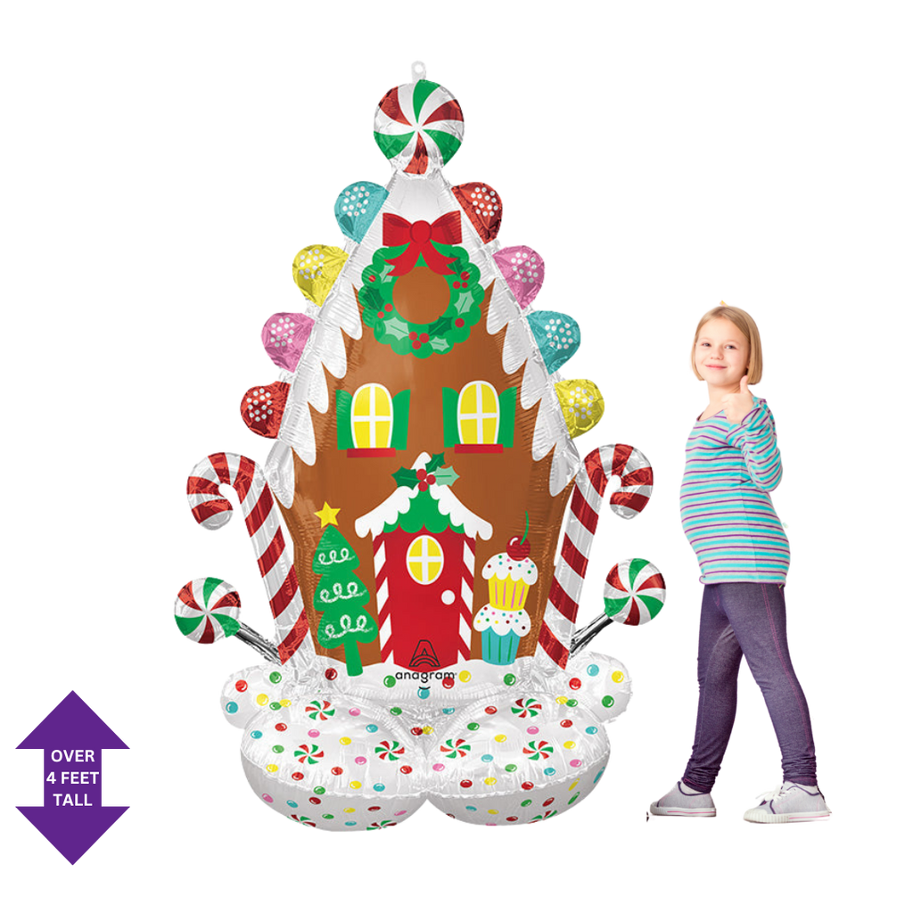 Colorful gingerbread house inflatable foil balloon Christmas decoration from Parte Haus party supply store in Bethesda MD