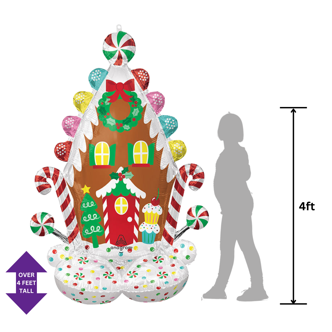 Colorful gingerbread house inflatable balloon with candy and wreath Christmas decor from Parte Haus party supply store in Bethesda Maryland