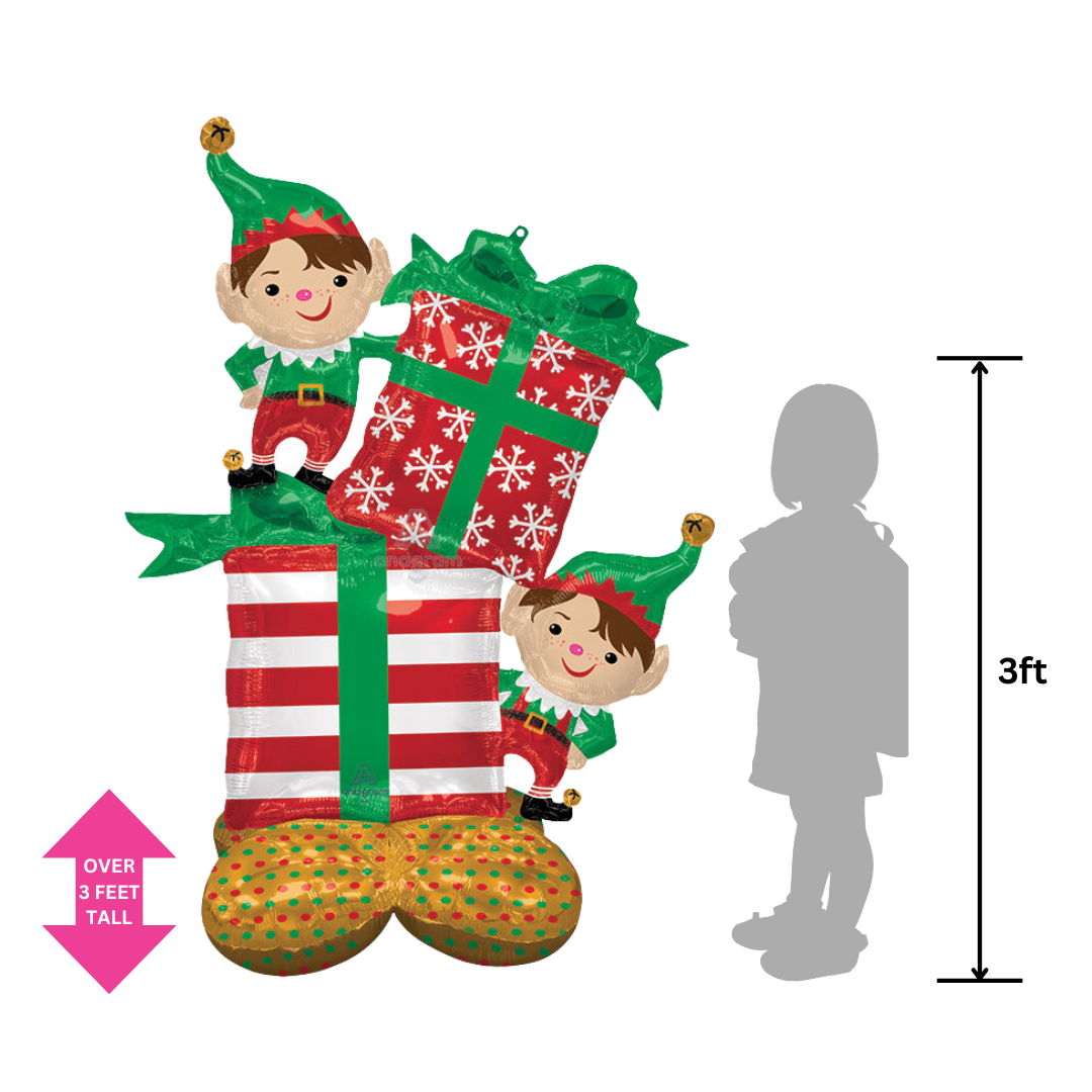 Green and red inflatable Christmas elves foil balloon with gift boxes Christmas decor from Parte Haus party supply store in Bethesda MD