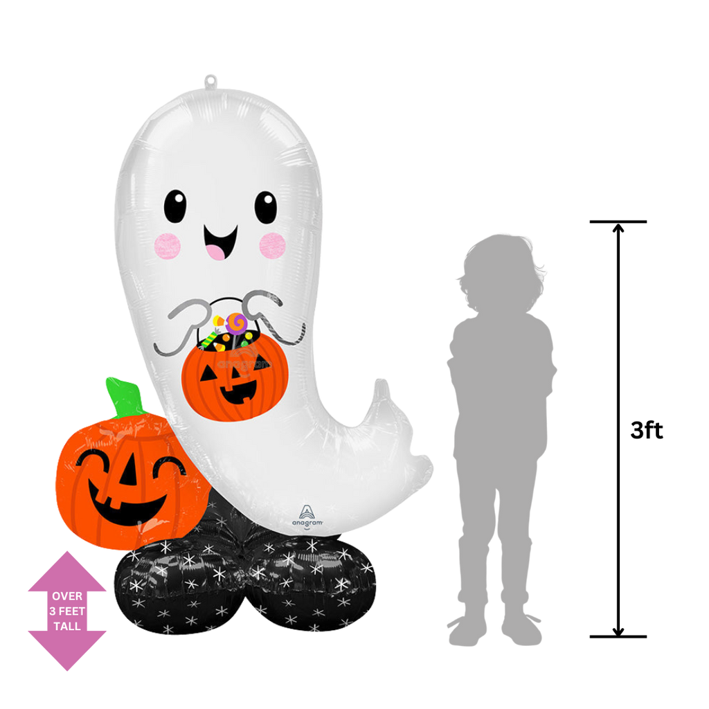 White inflatable ghost foil balloon holding a pumpkin Halloween decoration from Parte Haus party supply store in Bethesda MD